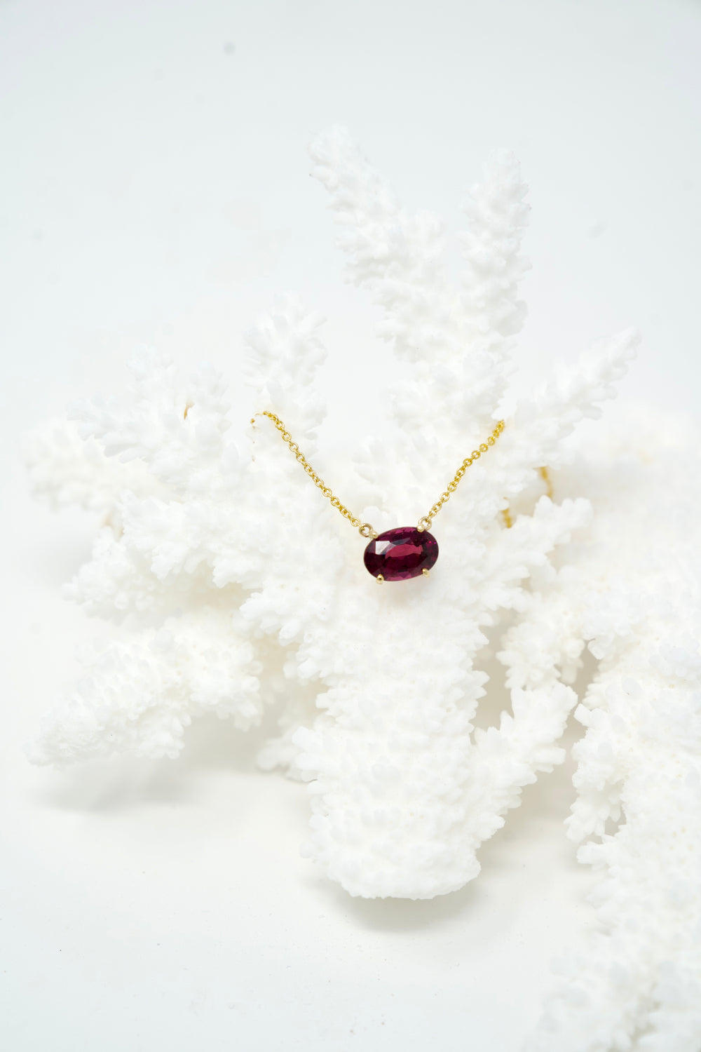 East-West Color-Changing Garnet Pendent Necklaces