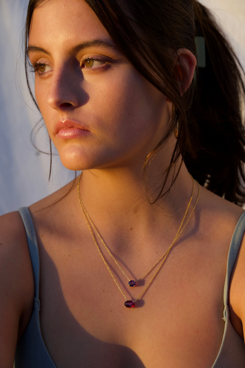 East-West Color-Changing Garnet Pendent Necklaces